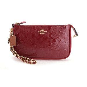 Coach signature debossed patent leather wristlet